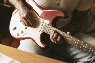 man playing a guitar