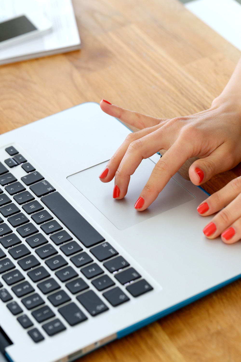 person typing on laptop